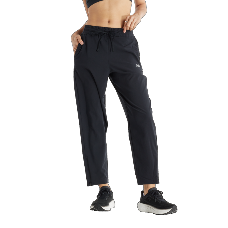 New Balance Sport Essentials Performance Woven Pant - Running leggings - Women's | Hardloop